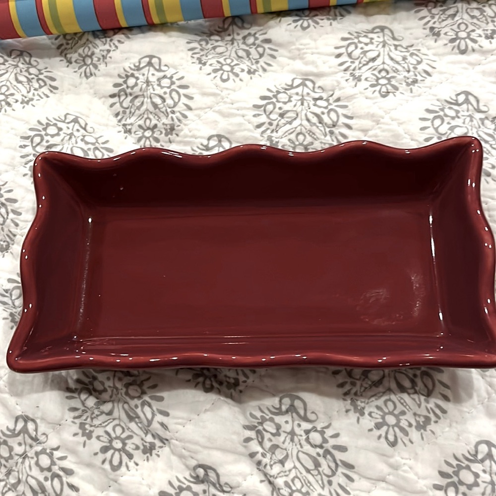 Vintage Henn Pottery Dish maroon color.  Rectangular with scalloped edges.